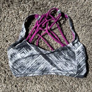 Lululemon sports bra, no padding provided but does have slits to add padding.